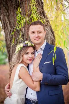 Bride groom garden hugs Stock Photos