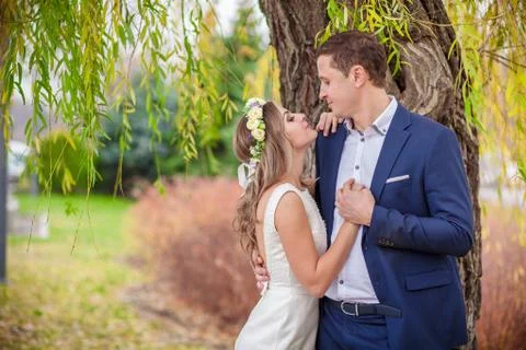 Bride groom garden hugs Stock Photos