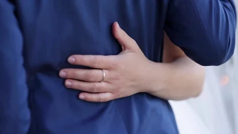 The bride hand on her husband back 動画素材 77359106