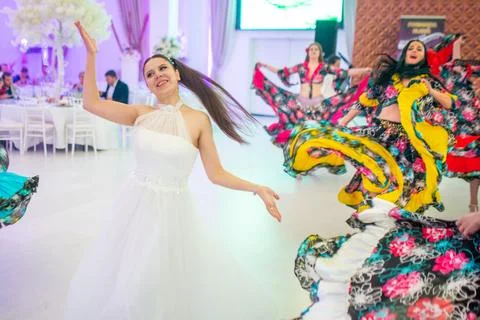 Bride having fun at her wedding Stock Photos