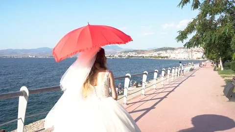 Bride with heart shaped umbrella Stock Footage 111297953