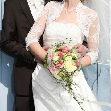 Bride is held by groom 写真素材