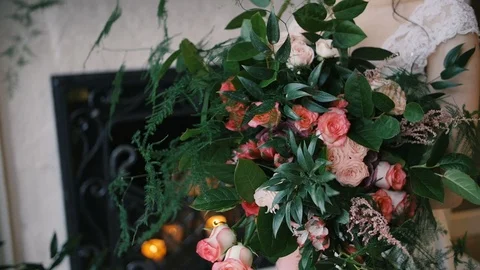 Bride held wedding bouquet in her arms Video stock 73986565