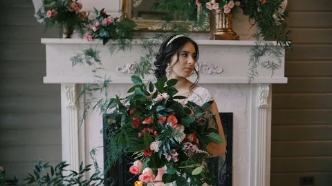 Bride held wedding bouquet in her arms Stock Footage 73986772
