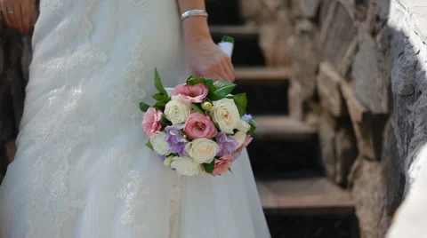 Bride hold bouquet in her hand Stock Footage 45862805