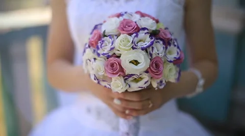 The bride holding a bouquet Stock Footage 55917946