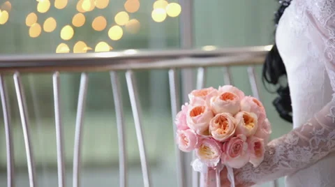 The bride is holding a bouquet of peonies Stock Footage 59046095