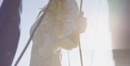 Bride Holding Rope On A Sunny Day Stock Footage