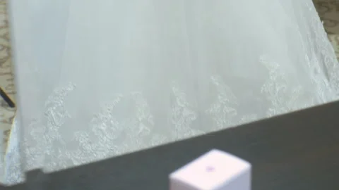 Bride holding s a bottle of charming perfume 動画素材 87677834