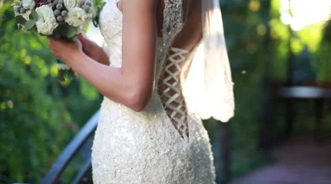 Bride holding wedding bouquet Stock Footage 46743963