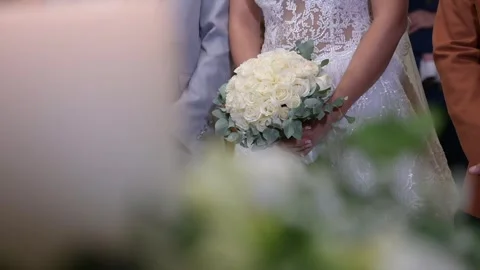 Bride holding a wedding bouquet Video stock 245017415