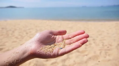 Bride Holding Wedding Rings on a Beach. Slow Motion. Stock Footage