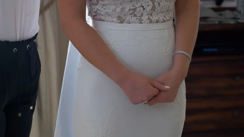 Bride holds hands Stock Footage 93644880