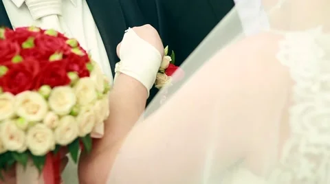 The bride holds the wedding bouquet Vídeo Stock 63601300
