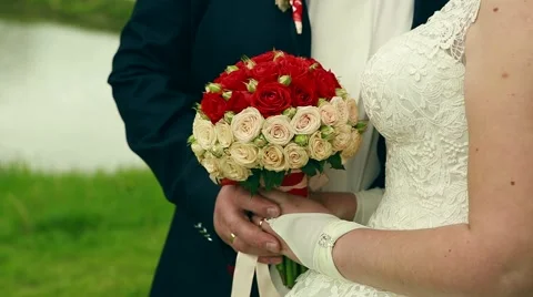 The bride holds the wedding bouquet Stock Footage 63601333