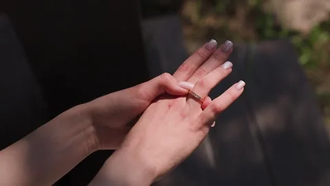 The bride holds a wedding ring in her hands Stock Footage 329092355