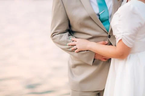 The bride is hugging the groom Stock Photos