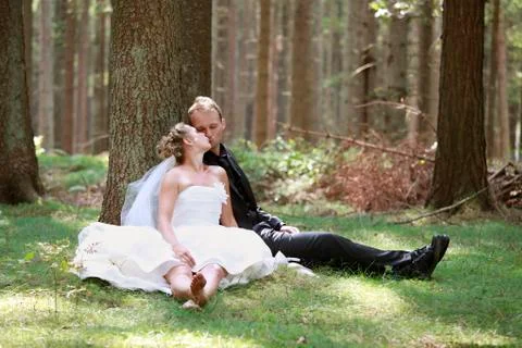 Bride kiss in the forest Stock Photos