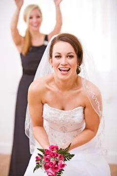 Bride: Laughing Bride Ready To Throw Bouquet Stock Photos
