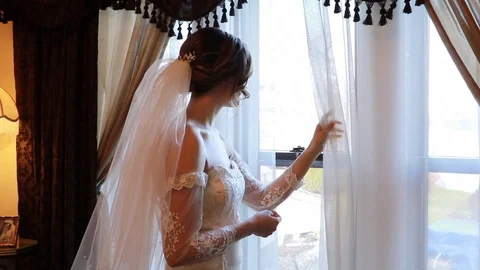 Bride Looking out Window Video stock 87475473