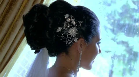 Bride Looking Out Window Holding Flowers Stock Footage 21247665