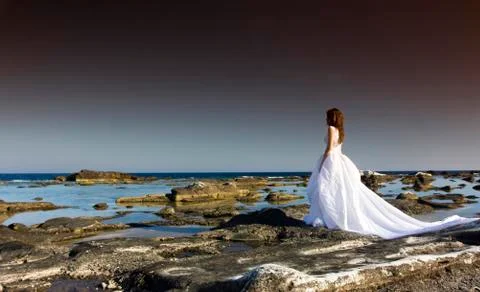 Bride looking at the sea Stock Photos