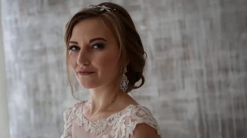 Bride looks into the camera and smiling Stock Footage 69827912
