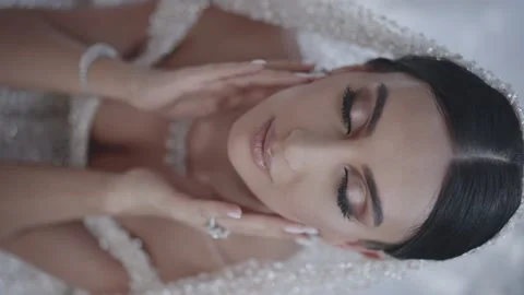 Bride looks up at camera 스톡 동영상 228412978