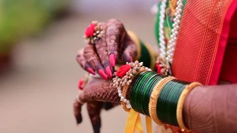 Bride mehandi design and bangles with flower jwellery Stock Footage 162624119