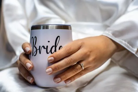 Bride metal cup on a table Foto stock