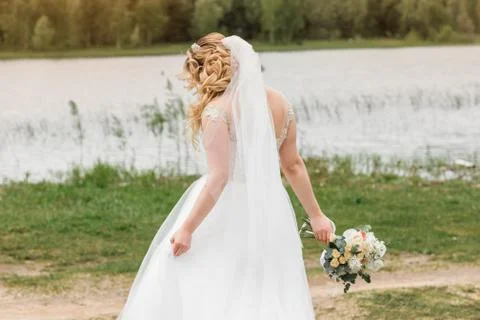 Bride on the nature Stock Photos