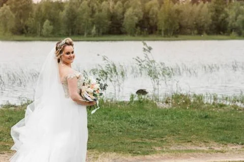 Bride on the nature Stock Photos