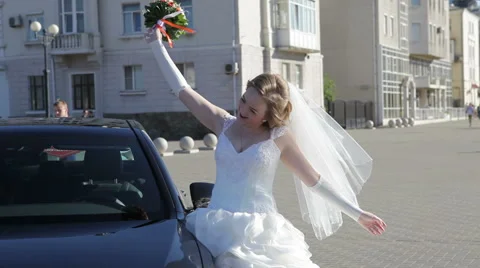 Bride next to the car Stock Footage 66333295