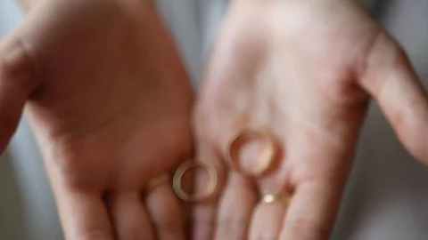 Bride Open Her Hands And Wedding Rings Appear Video stock 79211047