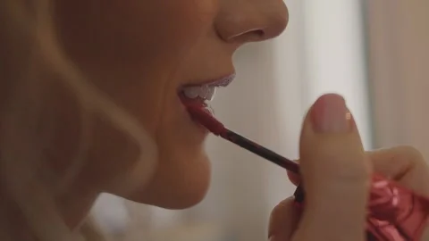 The bride paints her lips close-up Video stock 252142834