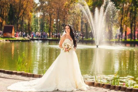 Bride in park Stock Photos