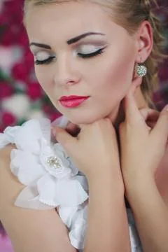 Bride on the peony background Stock Photos