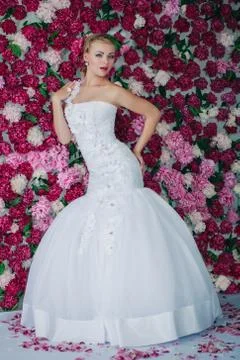 Bride on the peony background Stock Photos