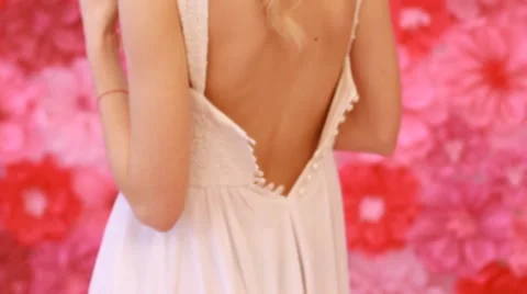 Bride on the pink flowers background Stock Footage 53799071