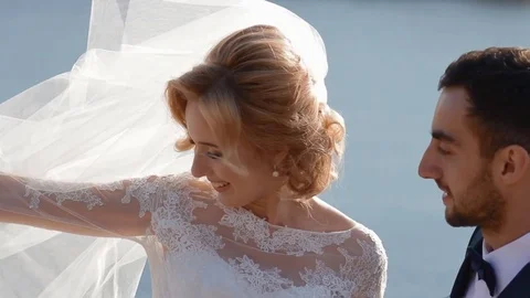 Bride play with her veil Stock Footage 70070264