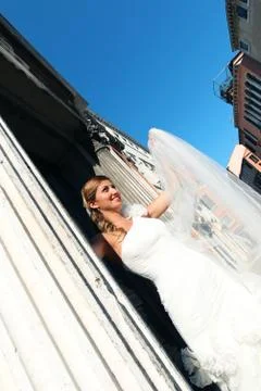 Bride playing with her veil Stock Photos