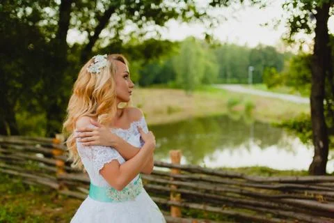 Bride portrait at summer sunset Stock Photos