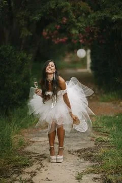Bride Posing Alone On A Garden Path Stock Photos