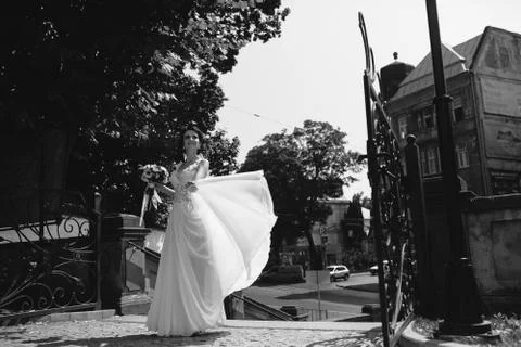 Bride posing in city Stock Photos