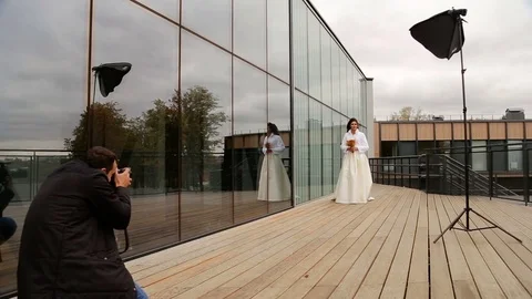 The bride posing to photographer Stock Footage 81033797