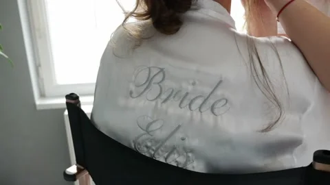 Bride prep back sliding shot Vídeo Stock 239987713
