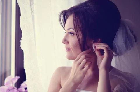 Bride preparing for her wedding day Stock Photos