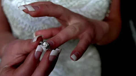 Bride Putting on Engagement Ring, Closeup, 1080p Video stock 14619358