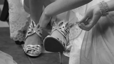 Bride Putting on Shoes Stock Footage 87332329