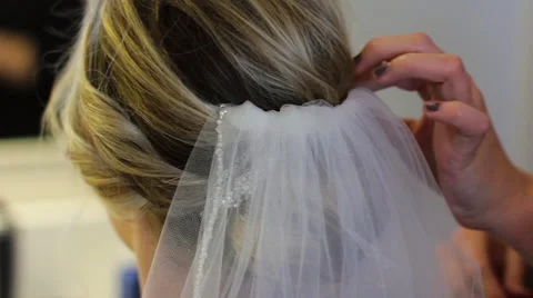 Bride Putting On Veil Stock Footage 61348825